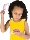 mixed-race child combing hair