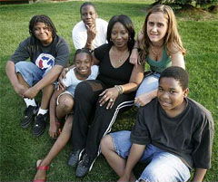 The Bushes: Justin, 16, left, Jeron, 14, Sandrea, 9, mum Regina, Stacey, 18, and Antonio, 13.